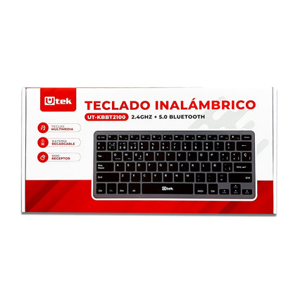 Teclado inalámbrico UTEK UT-KBBT2100 con conectividad Bluetooth y 2.4GHz, diseño recargable y portátil.
